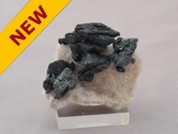 Hematite Pseudomorphs after Siderite on Feldspar 