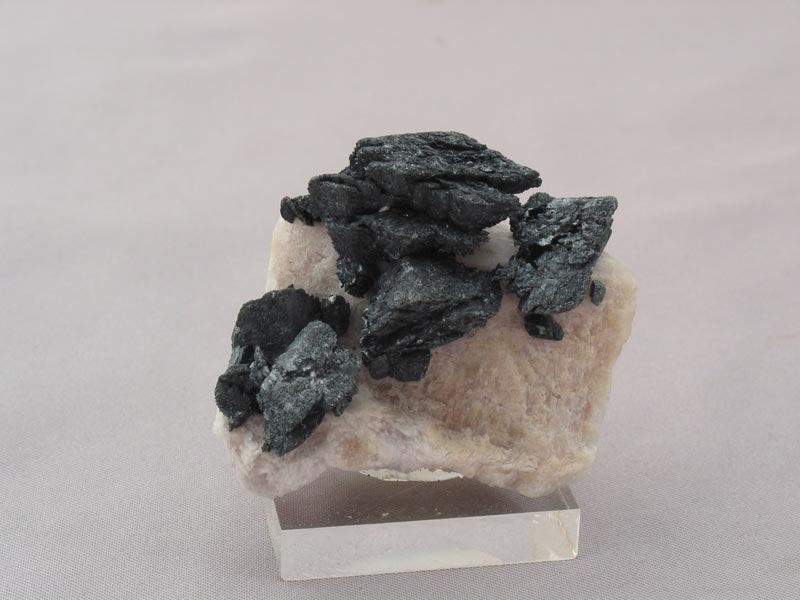 Hematite Pseudomorphs after Siderite on Feldspar 